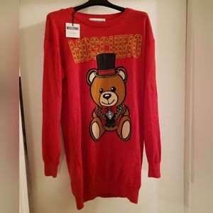 Moschino Couture tags on oversized tunic sweater dress